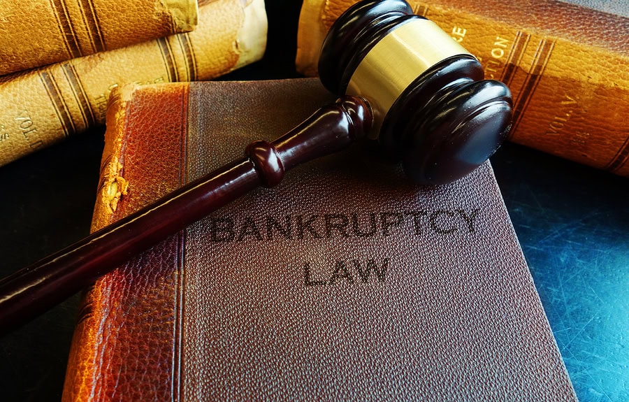 Bankruptcy law book with gavel on top, legal law, financial legal advice, legal proceedings, debt relief, Long Island bankruptcy & foreclosure.