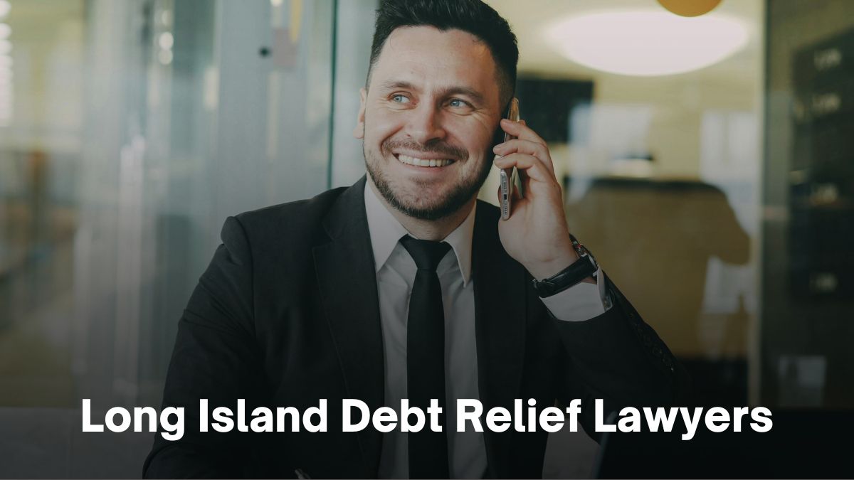 A smiling man in a suit talks on the phone beside text reading "Bankruptcy Attorneys Long Island & NYC.